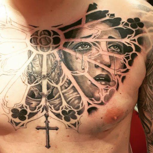 Explore sleeve tattoo ideas for ladies, creative tattoo ideas in Great Falls, available at Alpha Tattoos & Piercings