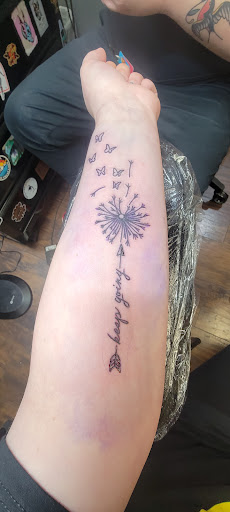 Explore tie dye tattoo ideas, creative tattoo ideas in Altoona, available at Railroad City Tattoo