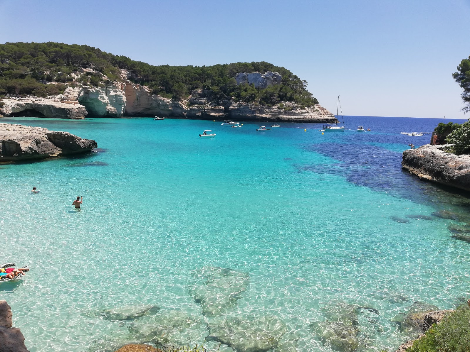 Photo of Cala Mitjaneta with partly clean level of cleanliness