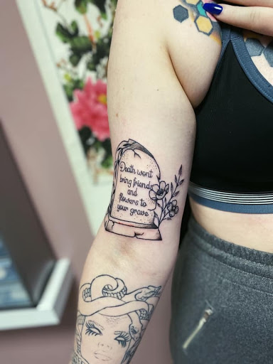 Explore cupid tattoo ideas, creative tattoo ideas in Kenosha, available at Kenosha Tattoo Company