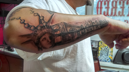 Explore sleeve tattoo ideas men, creative tattoo ideas in Lewiston, available at Altered Image Tattoo Studio