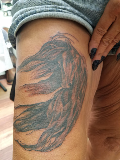 Explore outlaw tattoo ideas, creative tattoo ideas in Lima, available at Awesome Tat-2-U