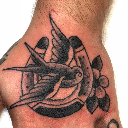 Explore one word tattoo ideas, creative tattoo ideas in Clawson, available at Eternal Tattoos