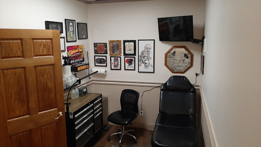 Explore bum tattoo ideas, creative tattoo ideas in Lakeview, available at Backwoods Tattoo Studio