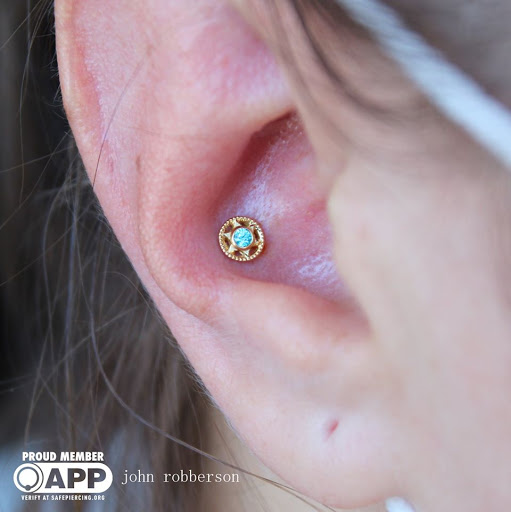 Explore women's hand tattoo ideas, creative tattoo ideas in Fort Myers, available at Tiger Lotus Tattoo and Piercing