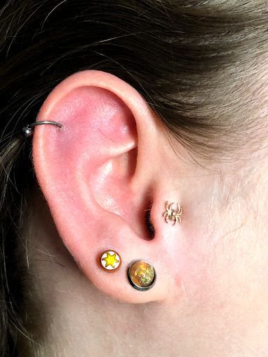 Explore hang loose tattoo ideas, creative tattoo ideas in Bloomington, available at Evil by the Needle Custom Tattoo and Piercing Studio