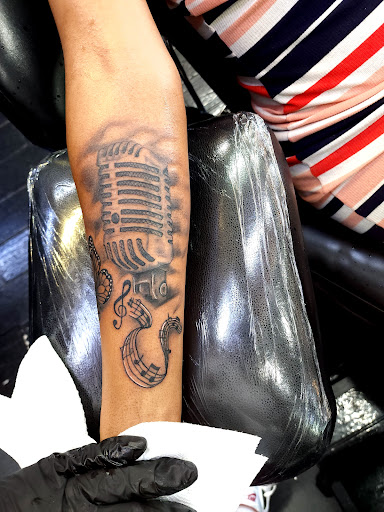 Explore top of foot tattoo ideas, creative tattoo ideas in Waterford, available at Memories Ink