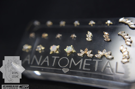 Explore eagle tattoo ideas for men, creative tattoo ideas in Mobile, available at Royal Stone Piercing