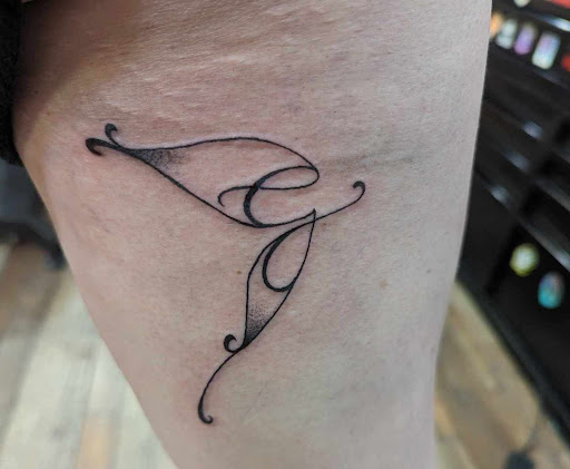 Explore pregnancy loss tattoo ideas, creative tattoo ideas in Clarksville, available at Dark Raine Tattoo