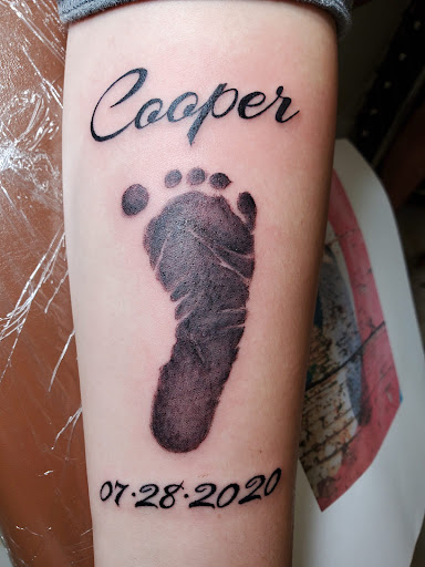 Explore bow tattoo ideas, creative tattoo ideas in Bowie, available at Studio 81 Tattoos