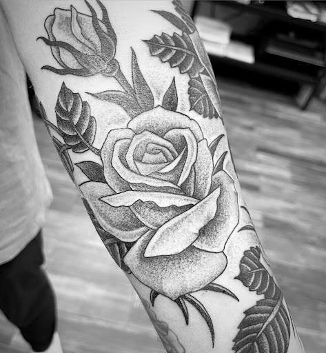 Explore smile tattoo ideas, creative tattoo ideas in Hendersonville, available at Revival Tattoo Company