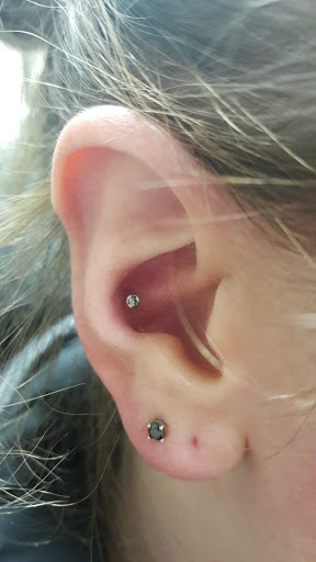 Explore owl tattoo ideas for females, creative tattoo ideas in Aurora, available at Ronin Tattoo Studio INC