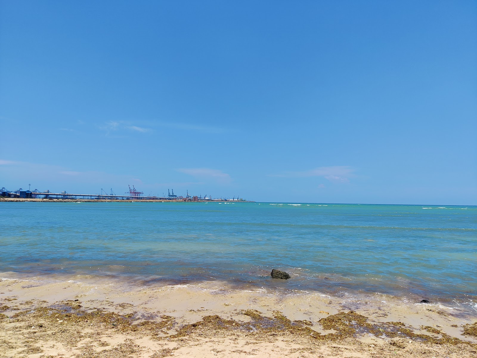 Foto van VOC Port Private Beach met turquoise puur water oppervlakte