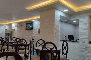 مطعم الحوش السوداني image