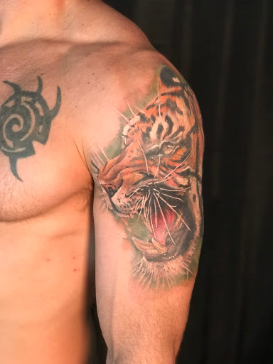 Explore wedding band tattoo ideas, creative tattoo ideas in Ocala, available at The Tattoo Gallery of Ocala LLC