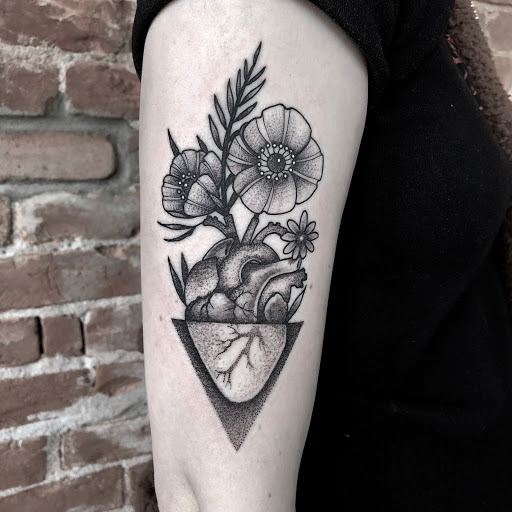 Explore miami dolphins tattoo ideas, creative tattoo ideas in Savannah, available at tattoos by delan