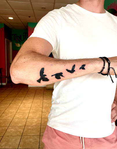 Explore black couple tattoo ideas, creative tattoo ideas in Berwick, available at Truth Custom Tattoo, Design & Gallery