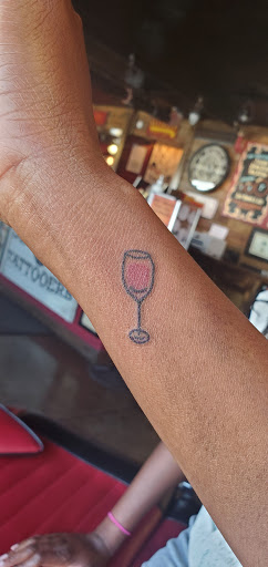 Explore smile tattoo ideas, creative tattoo ideas in Dallas, available at Lamar Street Tattoo Club