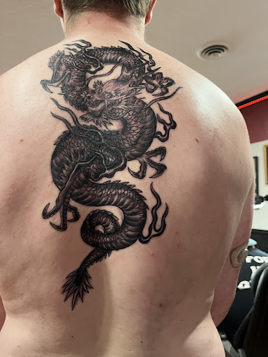 Explore male leg tattoo ideas, creative tattoo ideas in Coeur D Alene, available at Jojos Tattoo & Body Piercing