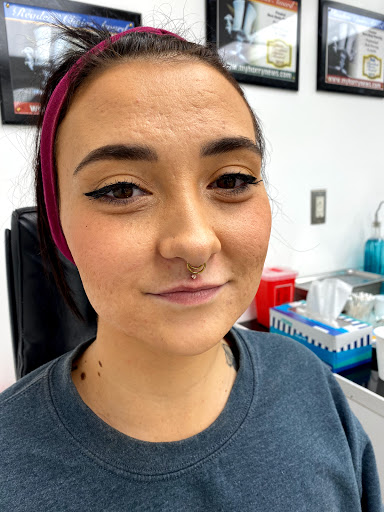 Explore wrestling tattoos ideas, creative tattoo ideas in Myrtle Beach, available at Professional Body Piercing by Jackie