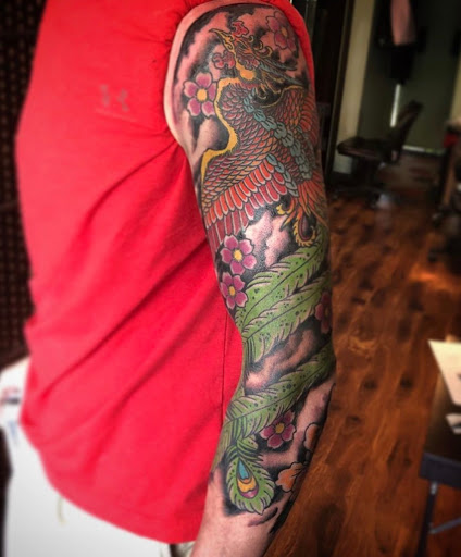 Explore neck tattoo men ideas, creative tattoo ideas in Lawrence, available at Standard Electric Tattooing