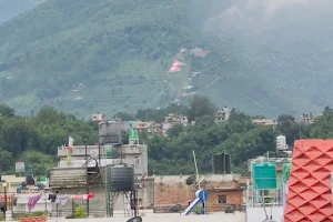 बत्ती बल्ने नेपालको झन्डा (Giant Nepalese Flag on the Hill) image