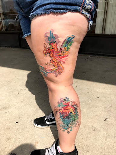 Explore small dinosaur tattoo ideas, creative tattoo ideas in Aurora, available at Ronin Tattoo Studio INC