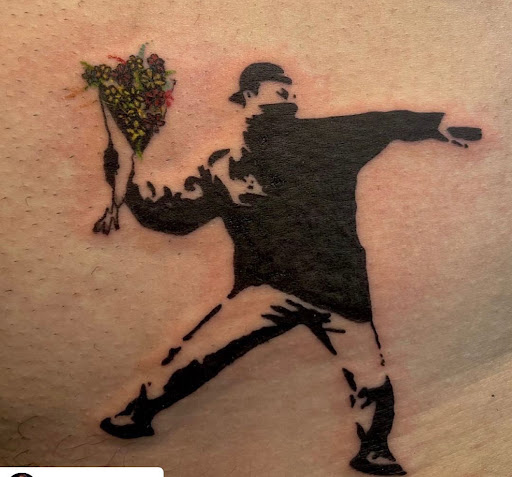 Explore cross tattoo ideas for woman, creative tattoo ideas in Fort Wayne, available at Grade A Tattoos and Body Piercing