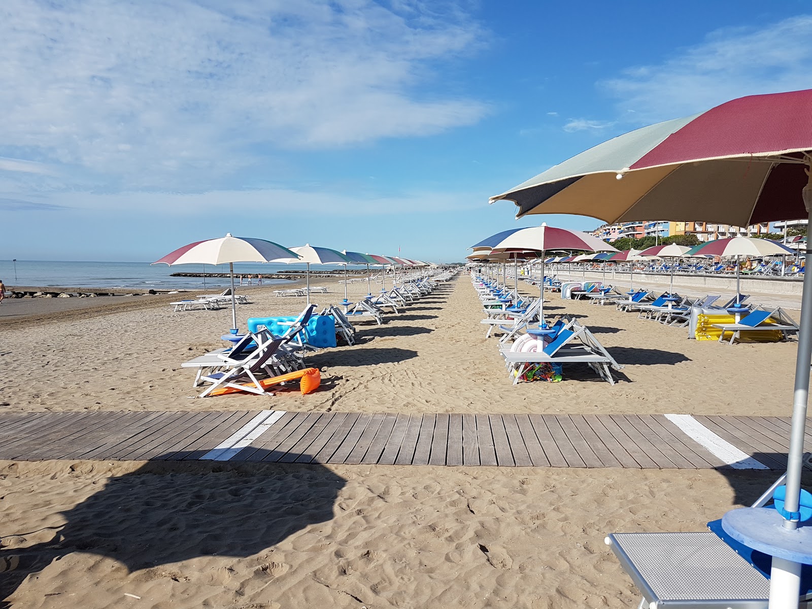 Spiaggia Libera Caorle的照片 带有明亮的沙子表面