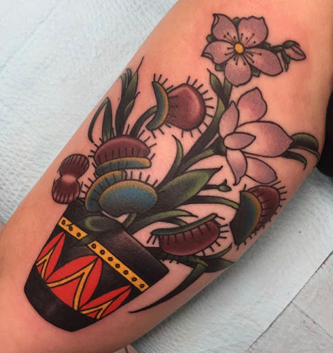 Explore back of the arm tattoo ideas, creative tattoo ideas in Gainesville, available at Bodytech Tattooing & Piercing