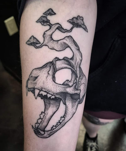 Explore disturbed tattoo ideas, creative tattoo ideas in Lewisburg, available at Rose and Dagger Tattoo