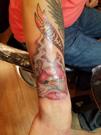 Explore bone tattoo ideas, creative tattoo ideas in Buffalo, available at Madd Ink Tattoo & Piercing