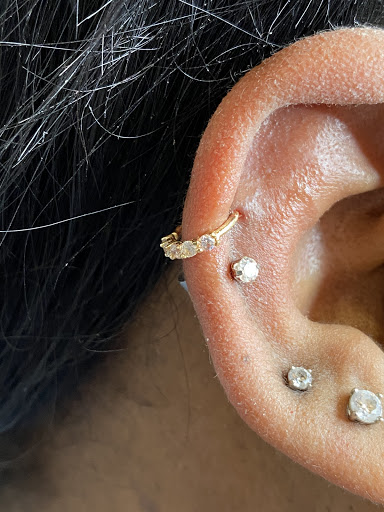 Explore korn tattoo ideas, creative tattoo ideas in Trumbull, available at Karma Piercing