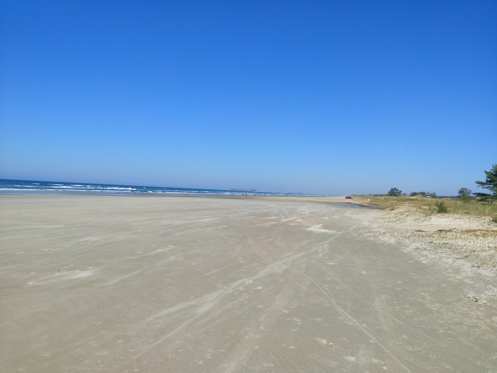 Foto av Praia da Vila Nova med lång rak strand