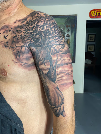 Explore chest cross tattoo ideas, creative tattoo ideas in Prescott, available at Catatonic Studios