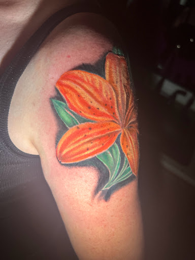 Explore tattoos behind ear ideas, creative tattoo ideas in Las Vegas, available at Work of Art Tattoo and Piercing