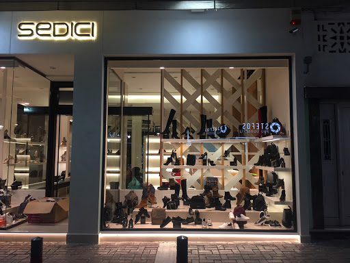 καταστήματα για να αγοράσουν γυναικείες μπότες στη μέση της γάμπας Αθήνα