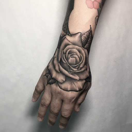 Tattoo Shop «The Divine Canvas Tattoos, Photography and Fine Art», reviews and photos, 1921 E Colonial Dr, Orlando, FL 32803, USA