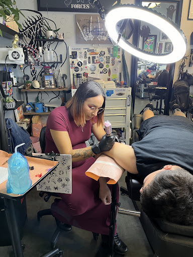 Explore leg tattoo cover up ideas, creative tattoo ideas in Navarre, available at Eleven 11 Tattoo Studio