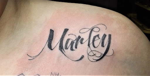 Explore tattoo ideas of dogs, creative tattoo ideas in Carlinville, available at MaloneTattoo