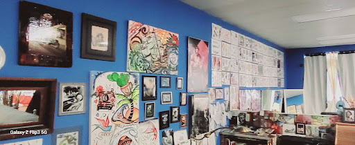 Explore back flower tattoo ideas, creative tattoo ideas in Englewood, available at The Original Big Daddy Tattoo & Body Piercing est.1997 est.1997