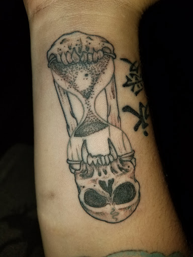 Explore hell hound tattoo ideas, creative tattoo ideas in Spokane, available at All About It Tattoo Studio