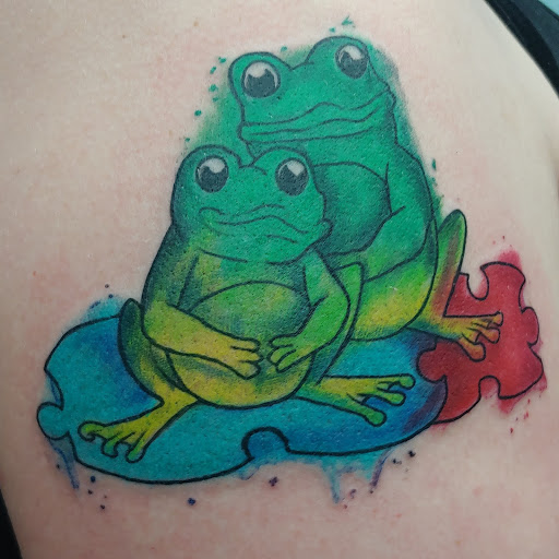 Explore tattoo on thigh ideas, creative tattoo ideas in Kannapolis, available at Ink Station Tattoo Studio