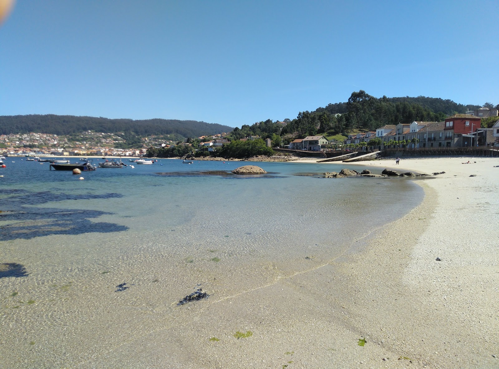 Foto di Praia de Beluso con una superficie del sabbia beige