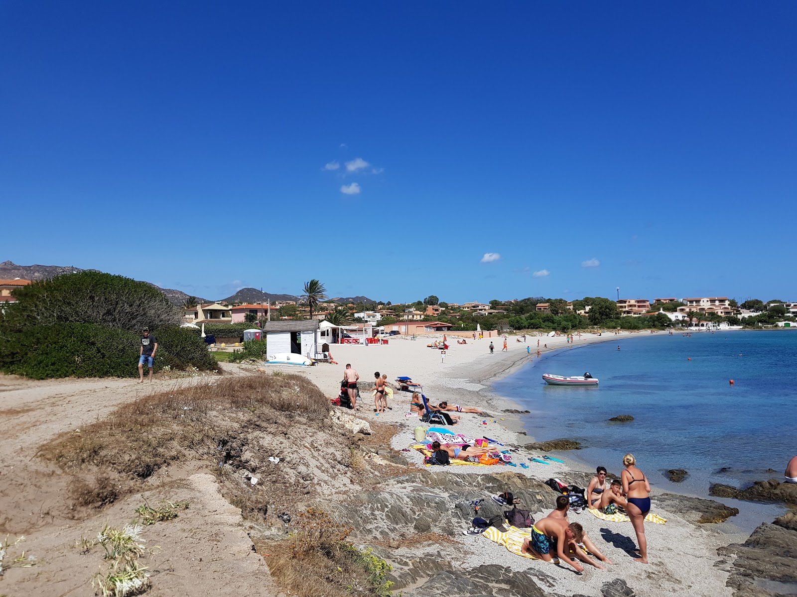 Foto van Spiaggia dello Squalo met helder zand oppervlakte
