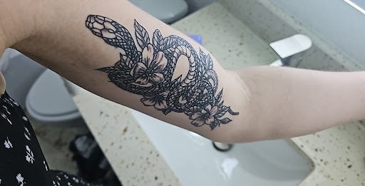 Explore adoption tattoo ideas, creative tattoo ideas in Waterford, available at Bluz Tattooz & Body Piercing Inc.