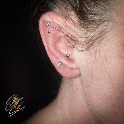 Explore book lovers tattoo ideas, creative tattoo ideas in Sandpoint, available at Bleeding Hearts Tattoo Emporium
