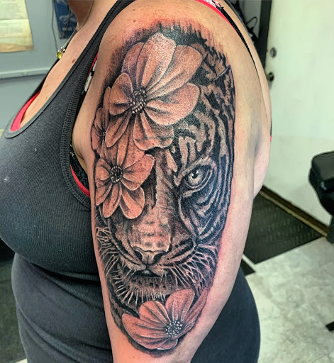 Explore pitbull tattoo ideas, creative tattoo ideas in Hudson Falls, available at ALTERED ADDICTION TATTOOS