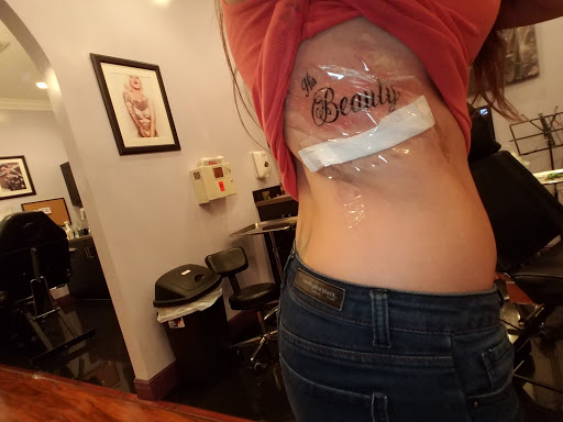 Tattoo Shop «Salvation Tattoo Lounge», reviews and photos, 1302 N University Dr, Coral Springs, FL 33071, USA