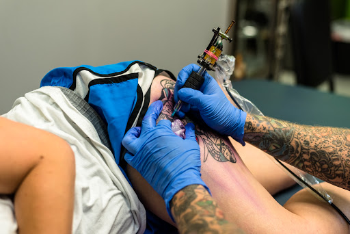 Explore wall-e tattoo ideas, creative tattoo ideas in League City, available at Zen Body Art & Adornment Tattoo Shop